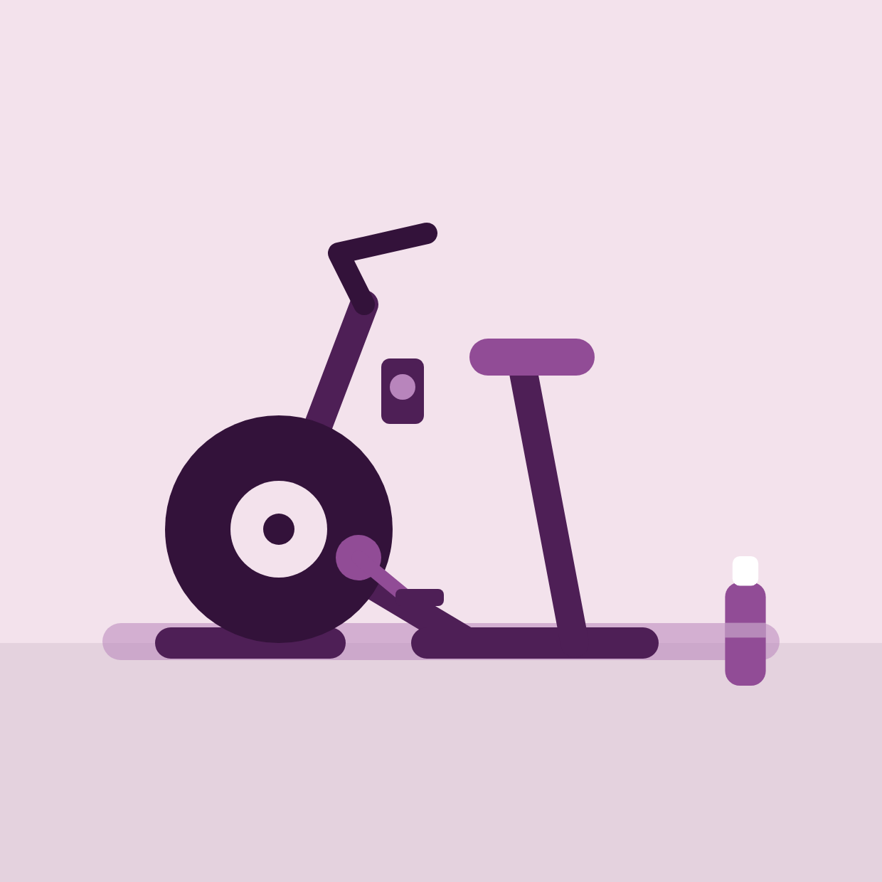 A studio bike standing on a floor mat.